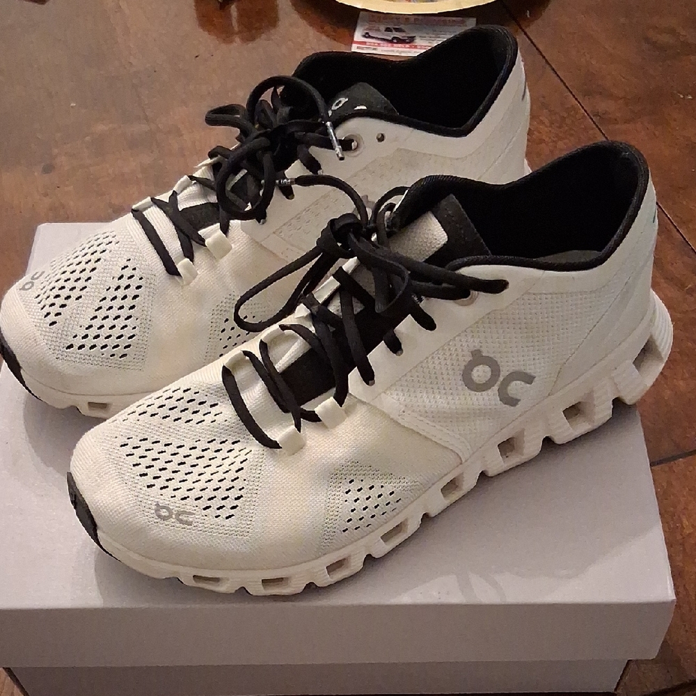 On Running Woman's White and Black Athletic Shoes